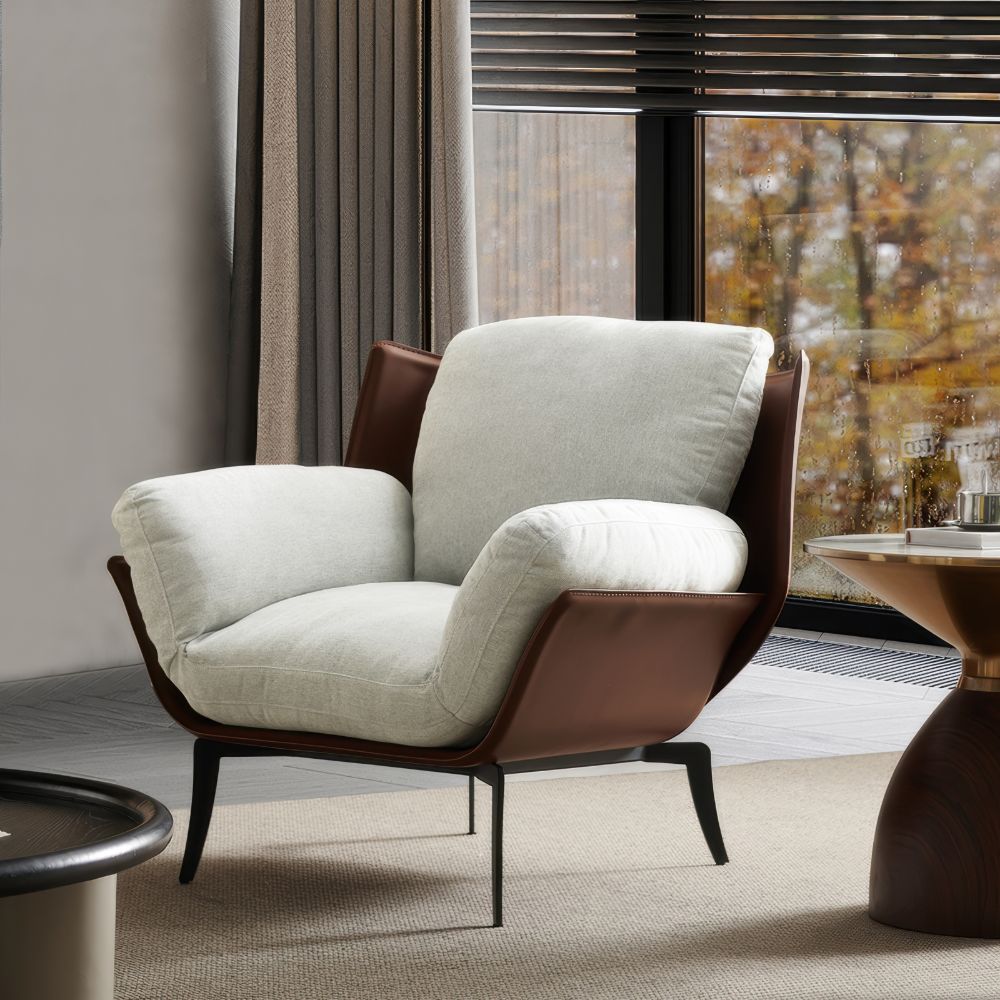 Italian minimalist lounge chair — a comfortable single-seat sofa.