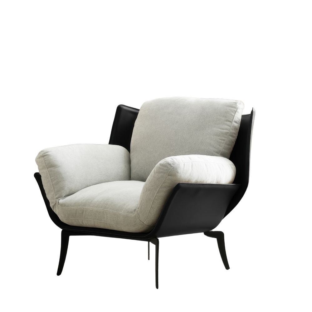Italian minimalist lounge chair — a comfortable single-seat sofa.