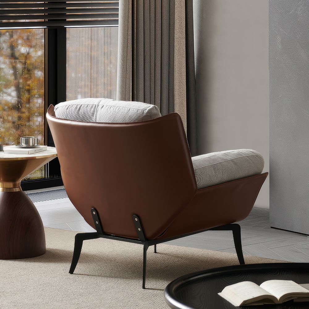 Italian minimalist lounge chair — a comfortable single-seat sofa.